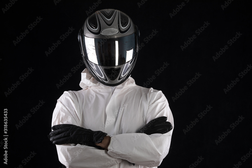 Fototapeta premium racer in a helmet in a white overalls