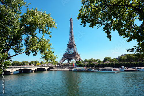 Eiffel Tower with River Seine on a sunny summer day in Paris, France