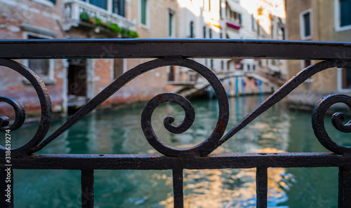 Photos Forged decorative aged rusty metal grid grille fence gate detail, Venice, Italy
