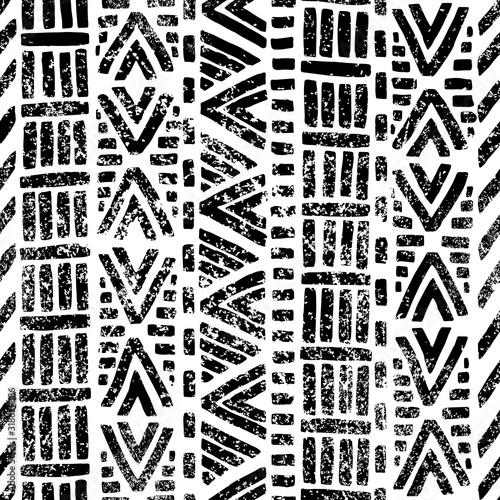Seamless black and white pattern. Ethnic and tribal motifs. Grunge texture. Print for textile, carpet, yoga mat, surfboard. Vector illustration.
