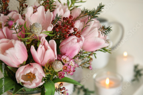 Beautiful bouquet with spring pink tulips on light background  closeup