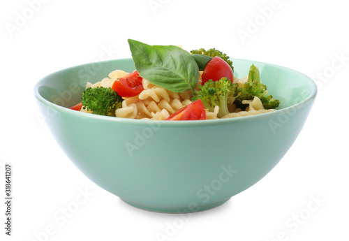 Tasty pasta with broccoli, cherry tomatoes and basil isolated on white