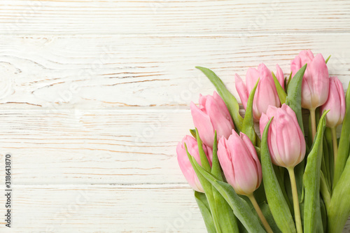Fototapeta Naklejka Na Ścianę i Meble -  Beautiful tulips on wooden background, space for text