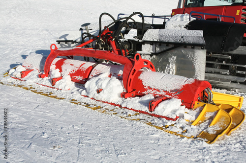 A snow cat machine for repairing runways at skiing place