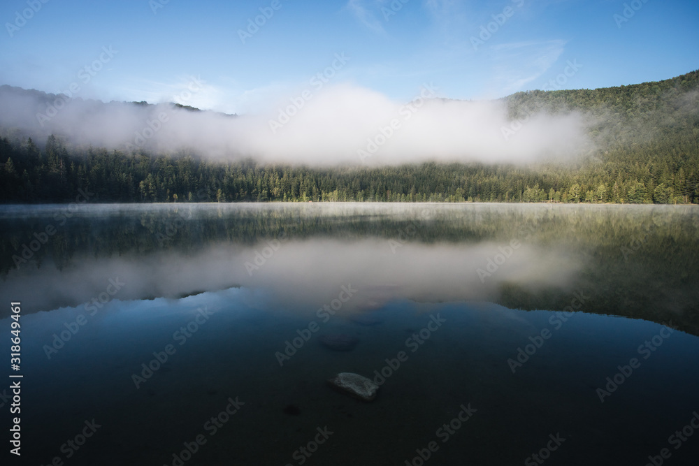 Morning mist on the lake of Saint Anne,Romania,Transylvania.Summer season Morning mist on the lake of Saint Anne,Romania,Transylvania.Summer season
