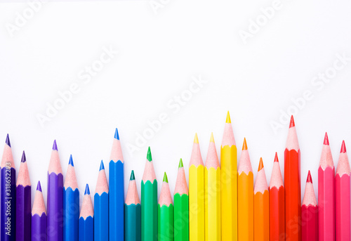 Different color pencils on white background. Composition with colored pencils, closeup view, space for text