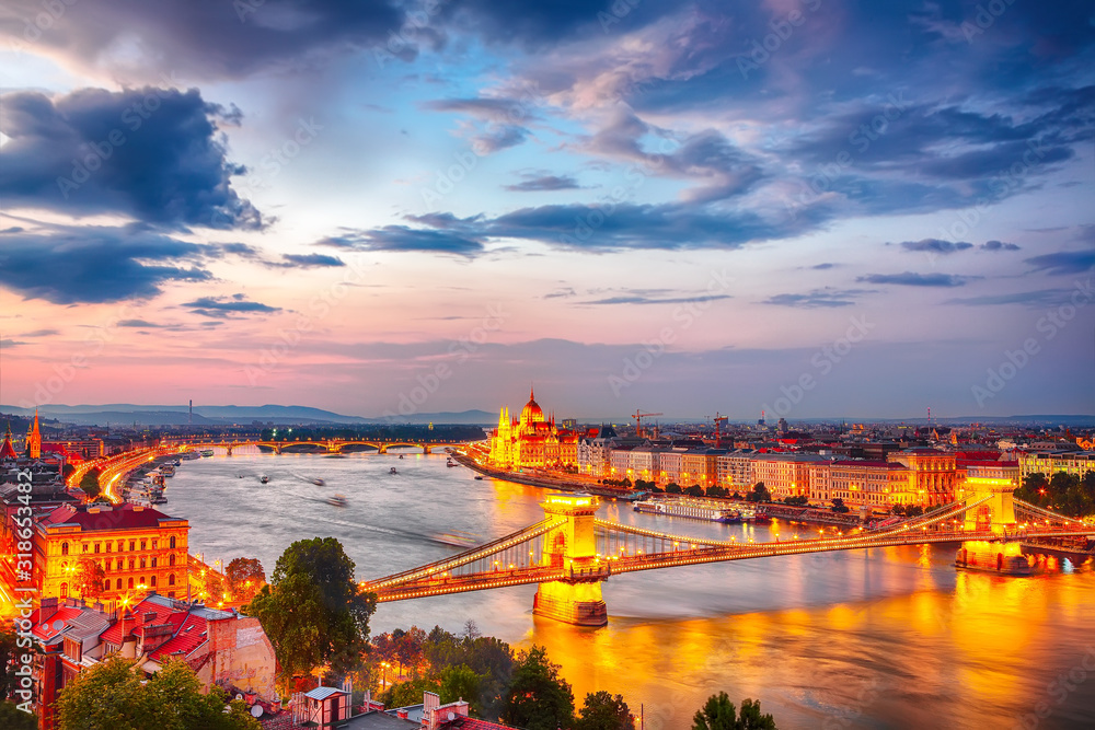 View at Chain bridge, river Danube and famous building of Parliament.