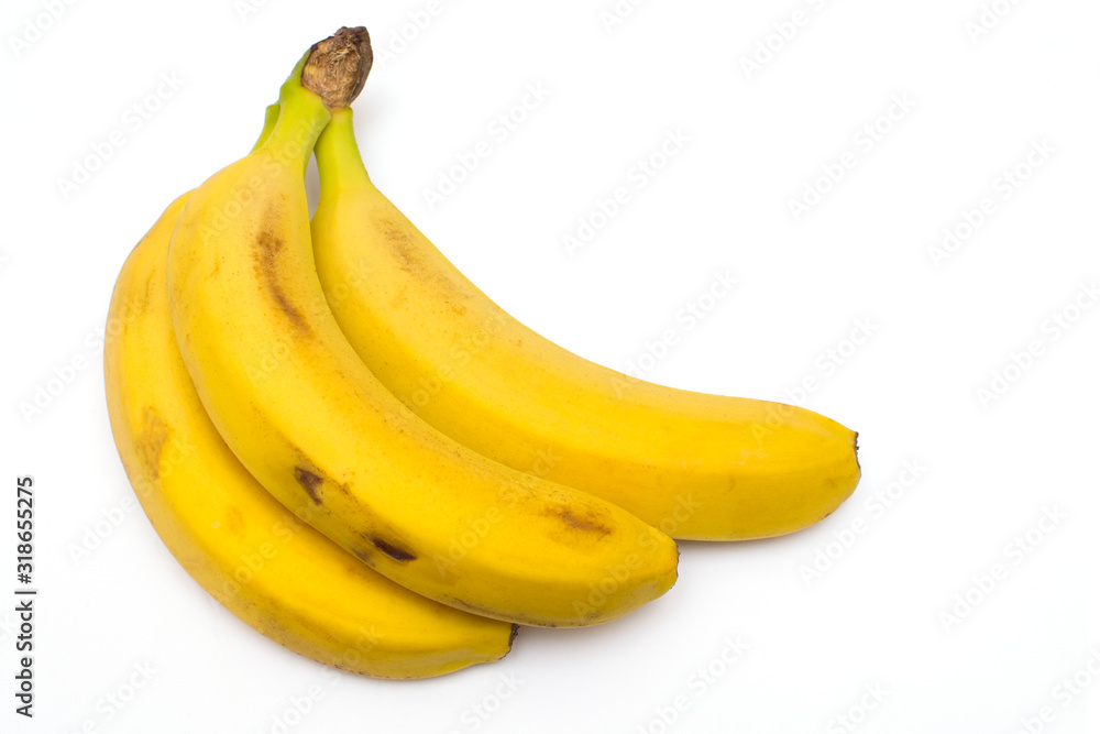 Bunch of ripe bananas isolated on a white background.