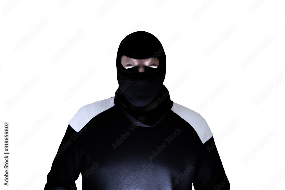 Burglar in dark clothes. Dangerous robber in mask. Criminal man. Isolated on white background. Burglar in dark clothes. Dangerous robber in mask. Criminal man. Isolated on white background.