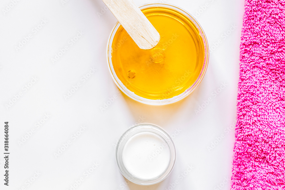 concept depilation with wax on white background top view concept depilation with wax on white background top view