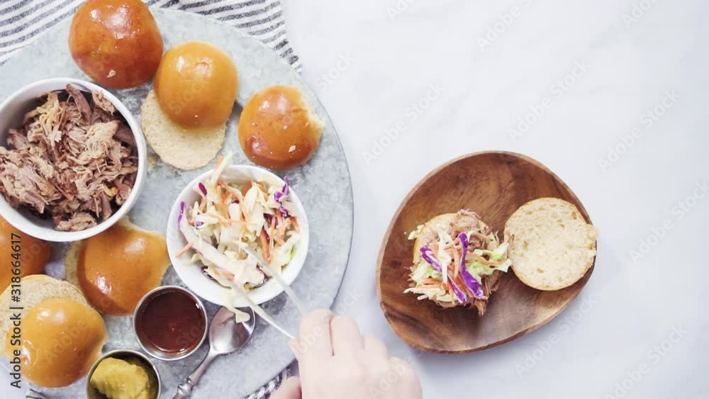 Flat lay. BBQ pulled pork sandwich in shape of small sliders with brioche buns. Flat lay. BBQ pulled pork sandwich in shape of small sliders with brioche buns.