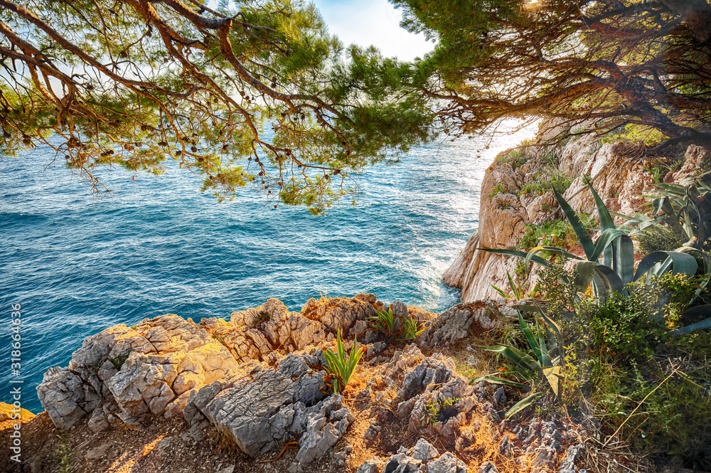 Beautiful sunset above Adriatic sea and coastline in Makarska. Beautiful sunset above Adriatic sea and coastline in Makarska.