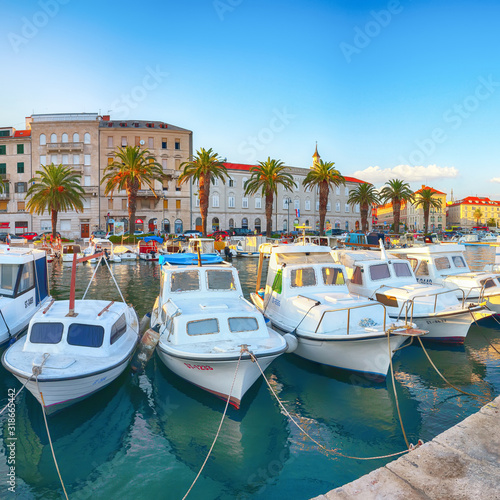 Amazing view of the promenade the Old Town of Split with boats and yachts in marina