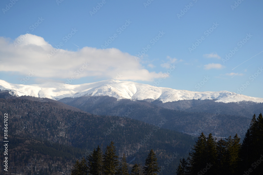 Carpathian mountains covered with snow, Romania.