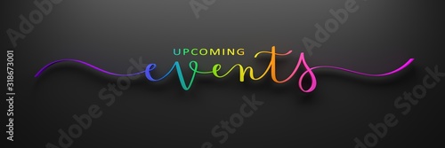 3D render of rainbow-colored brush calligraphy UPCOMING EVENTS on dark background photo