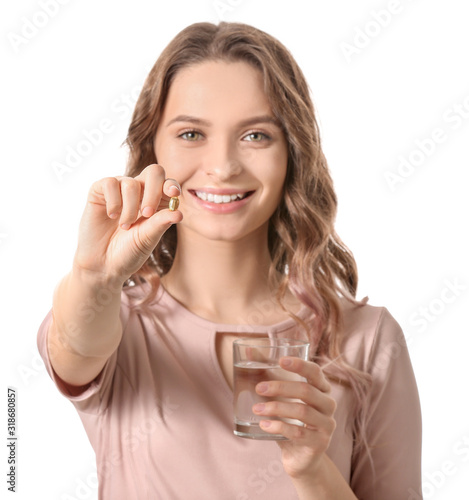 Young woman with fish oil o...