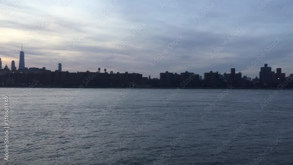 New city skyline across river skyscrapers of downtown Manhattan stock footage video New city skyline across river skyscrapers of downtown Manhattan stock footage video