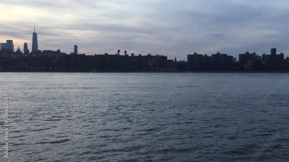 New city skyline across river skyscrapers of downtown Manhattan stock footage video New city skyline across river skyscrapers of downtown Manhattan stock footage video