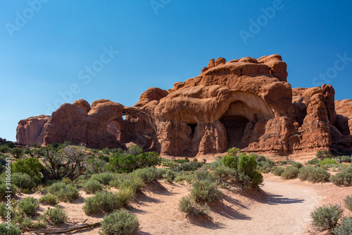 Double Arch is a close-set pair of natural arches in Arches National Park in southern Grand County  Utah  United States  that is one of the more known features of the park