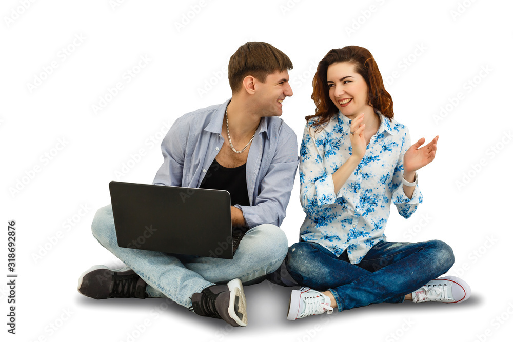 couple sitting with laptop. Hugging and smiling isolated on white background couple sitting with laptop. Hugging and smiling isolated on white background