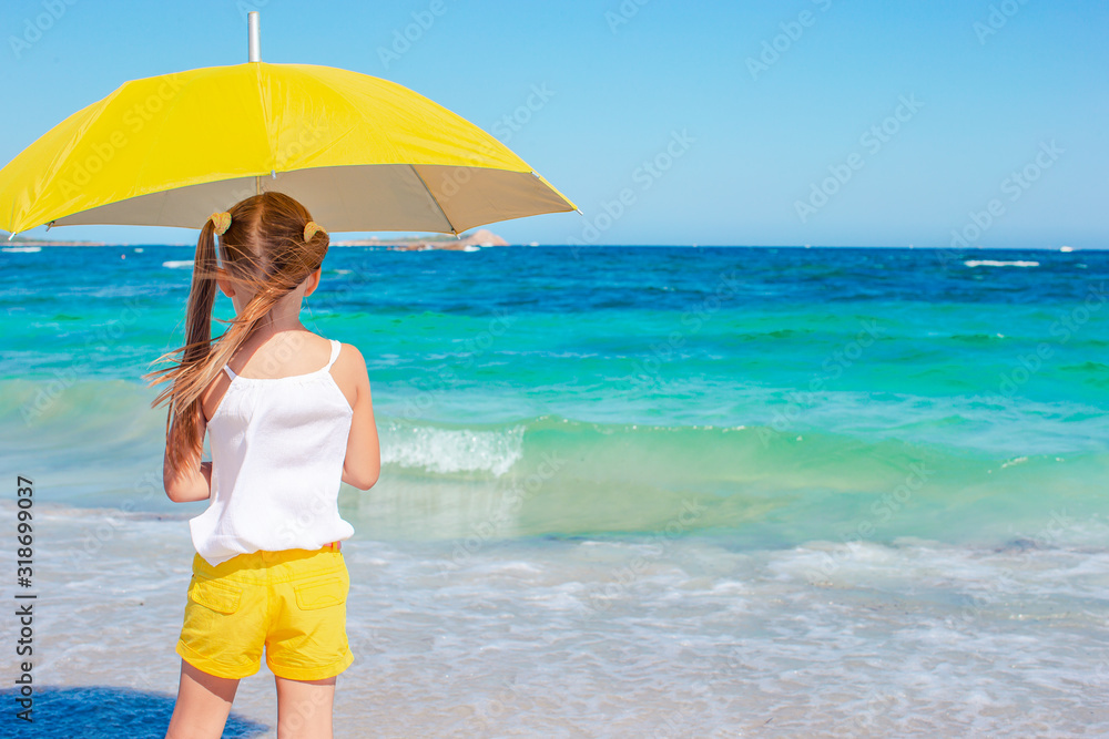 Happy girl enjoy summer vacation on the beach