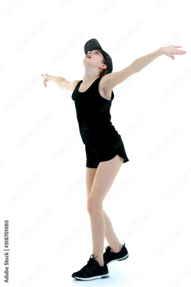 A teenage girl is engaged in fitness.The concept of children's s A teenage girl is engaged in fitness.The concept of children's s