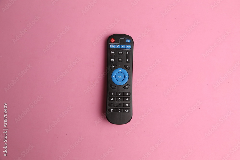 TV remote control in color background