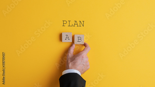 Businessman choosing plan B photo
