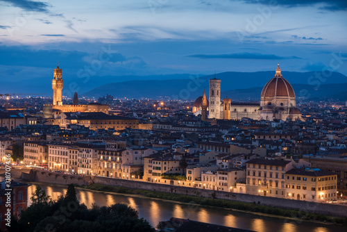 Florence panoramic view from above during blue hour with historical buildings Duomo churches and Ponte Vecchio © Michele