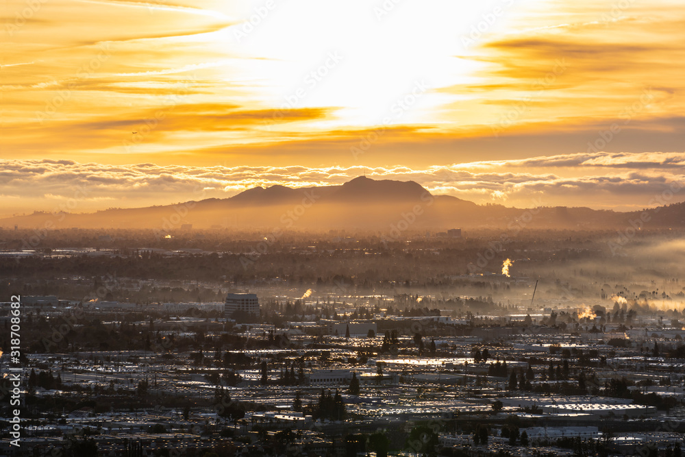 Los Angeles sunrise view across the San Fernando Valley towards Mt Lee and Mt Hollywood in popular Griffith Park. Photo taken from mountaintop at Santa Susana State Historic Park in Chatsworth. Los Angeles sunrise view across the San Fernando Valley towards Mt Lee and Mt Hollywood in popular Griffith Park. Photo taken from mountaintop at Santa Susana State Historic Park in Chatsworth.