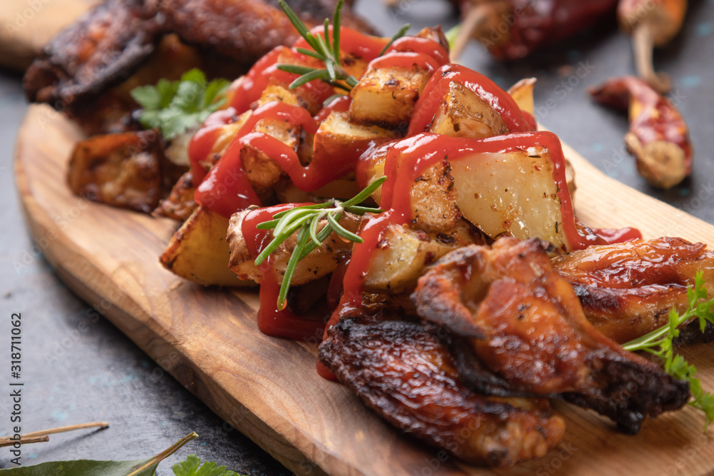 Roasted potato with chicken wings