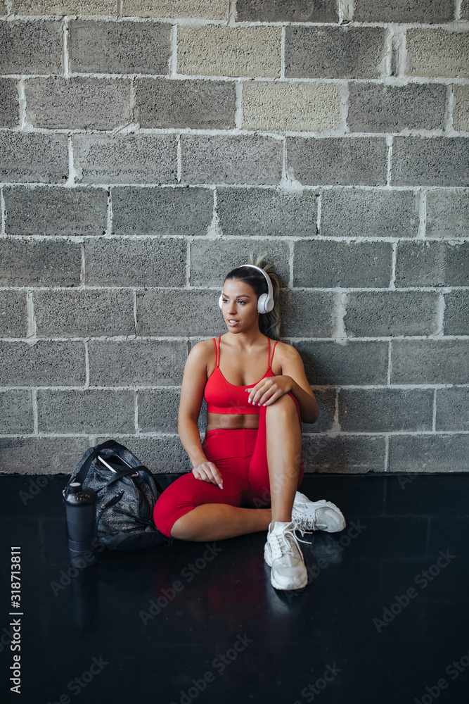 Thinking about her fitness goals Thinking about her fitness goals