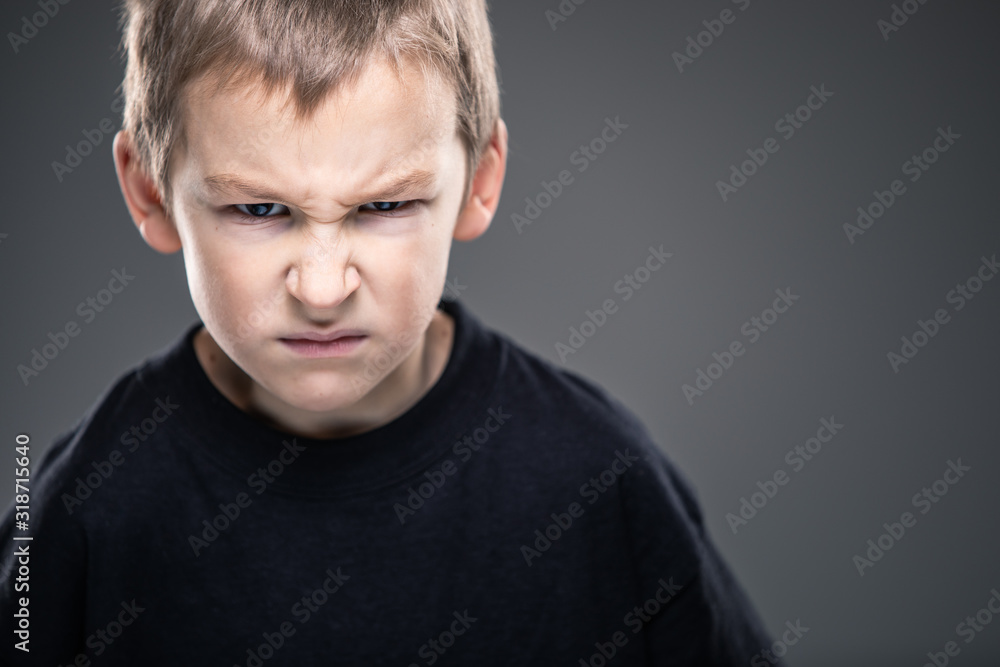 Loads of aggression in a little boy - education concept hinting behavioral problems in young children (shallow DOF) Loads of aggression in a little boy - education concept hinting behavioral problems in young children (shallow DOF)