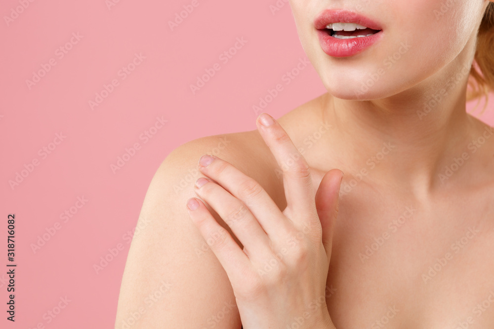 Close up cropped blonde half naked woman 20s perfect skin lips nude make up isolated on pastel pink wall background studio portrait. Skin care healthcare cosmetic procedures concept Mock up copy space Close up cropped blonde half naked woman 20s perfect skin lips nude make up isolated on pastel pink wall background studio portrait. Skin care healthcare cosmetic procedures concept Mock up copy space