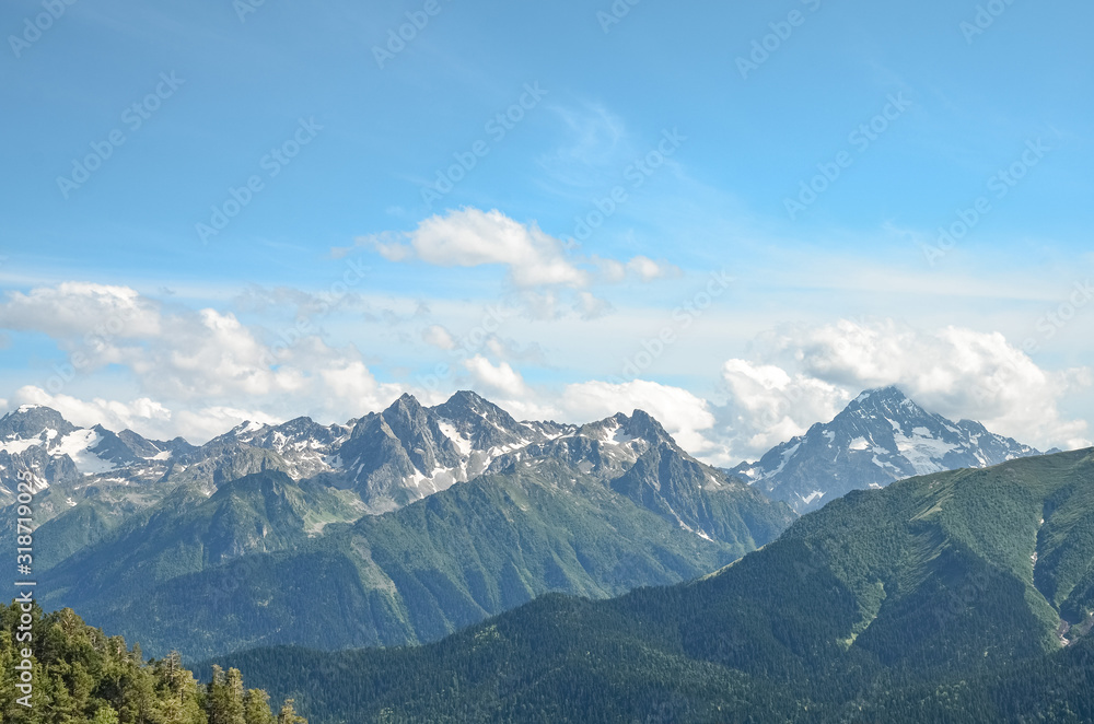 Sunny day in the mountains of Arkhyz. The Caucasus mountains with rocky peaks. Mountain landscape.