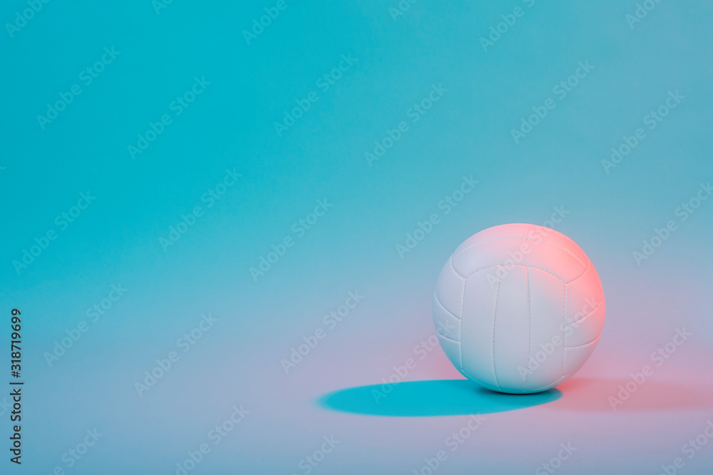 Volleyball ball isolated on neon background. Banner Art concept. Competition, draw..