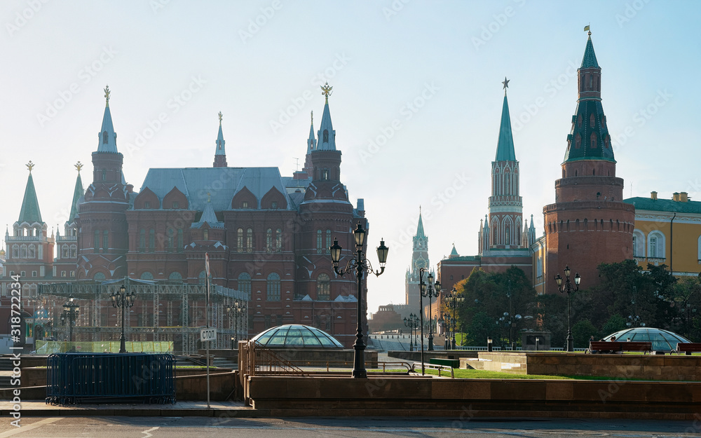 Fototapeta premium State Historical Museum and the Kremlin Towers on the Red Square in Moscow city in Russia in the morning.