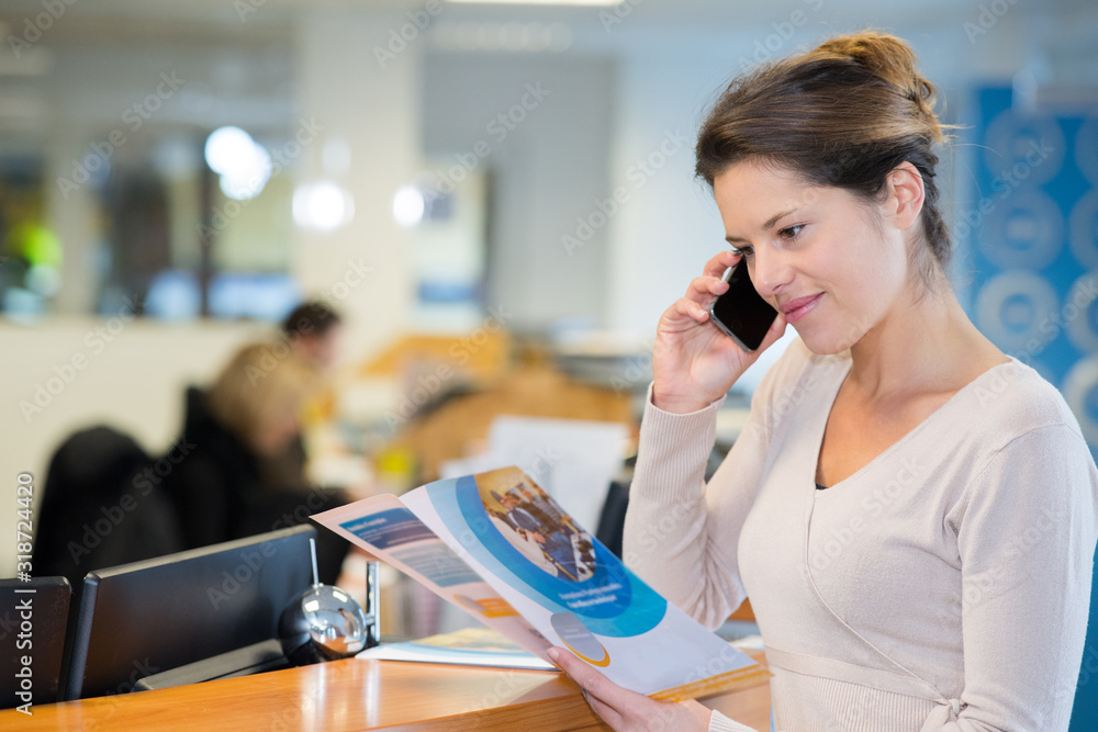 young woman at home buying by mobile phone young woman at home buying by mobile phone