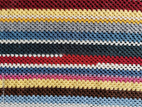 Home made colored crochet blanket. Strips Backgrounds.