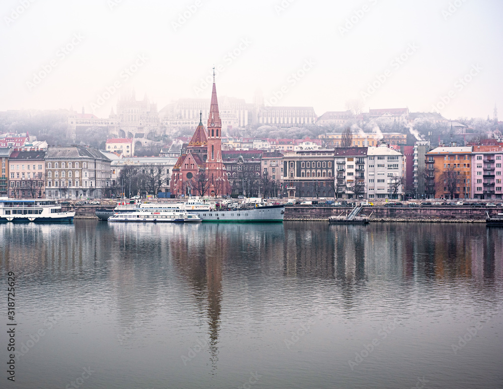 Fototapeta premium View on Buda riverbank covered in snow in Budapest, Hungary