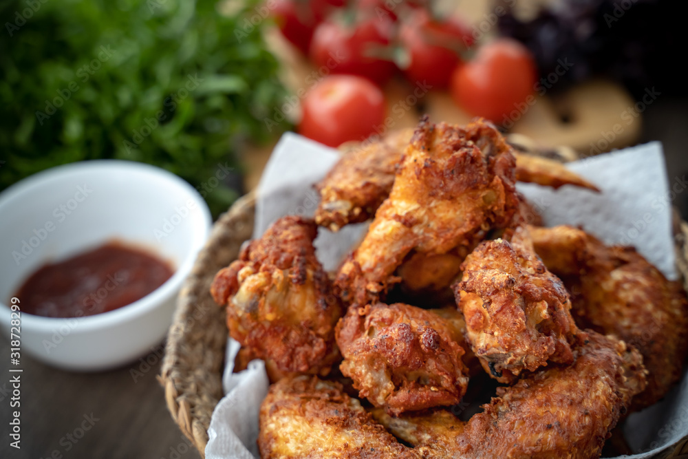 crispy fried chicken in the basket with salad crispy fried chicken in the basket with salad