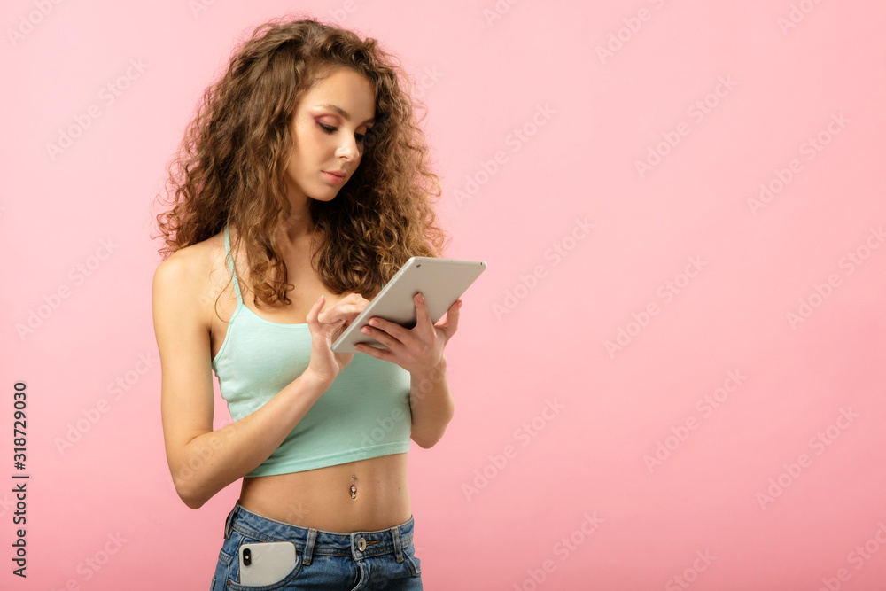Closeup studio portrait of pretty girl with tablet Closeup studio portrait of pretty girl with tablet