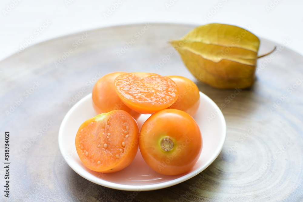  natural cape gooseberry on wooden background