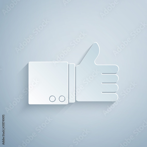 Paper cut Hand thumb up icon isolated on grey background. Paper art style. Vector Illustration
