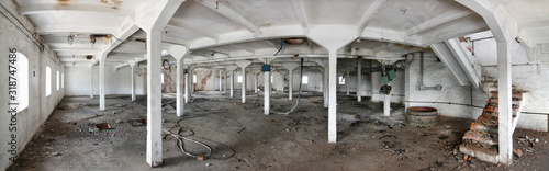 Panorama of the interior of the factory premises on an old abandoned brewery