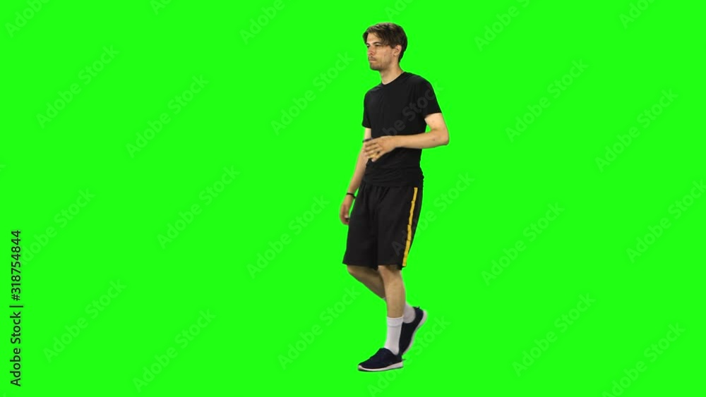 Brunette male is walking and drinking coffee from a paper cup. Chroma Key Brunette male is walking and drinking coffee from a paper cup. Chroma Key