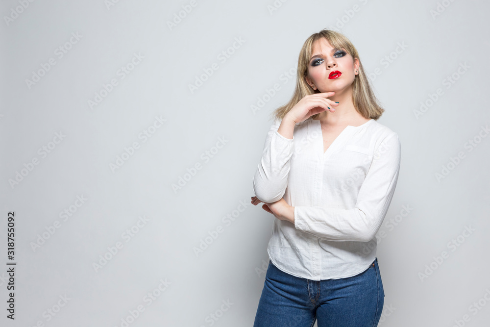 Portrait of Caucasian Female Blong Girl in Casual Clothing Indoors Portrait of Caucasian Female Blong Girl in Casual Clothing Indoors
