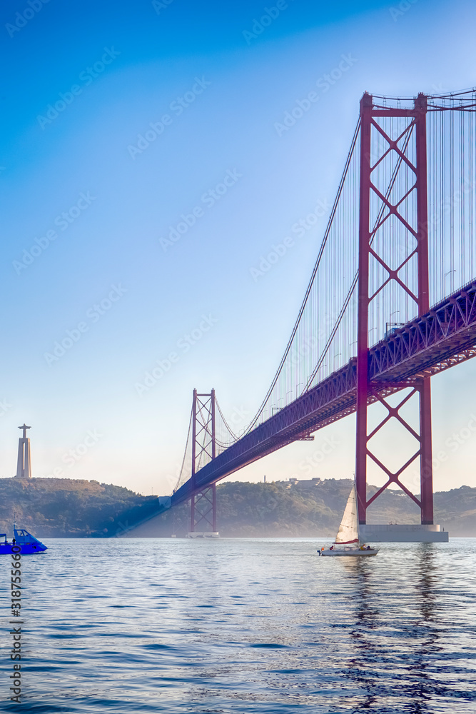 Fototapeta premium Amazing Image of Lisbon 25th April Bridge (Ponte 25 de Abril). Taken from Alfama.