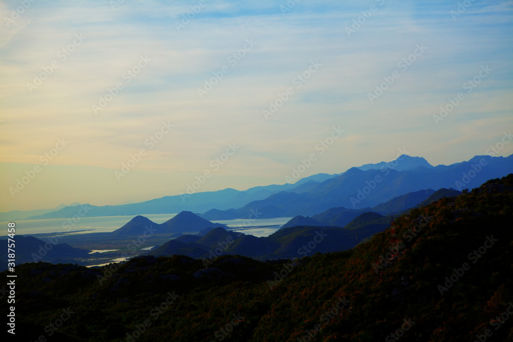 range of mountains and blue sea