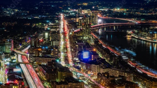 Aerial view time-lapse of Boston Turnpike traffic at sunset
